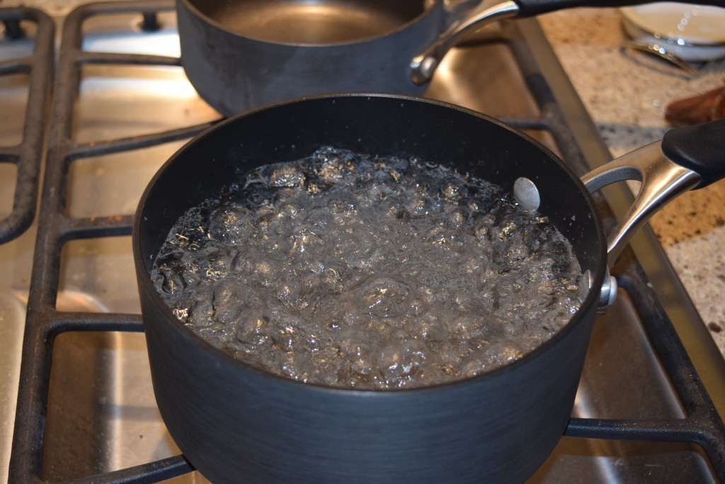 A second shot of the pot of water boiling